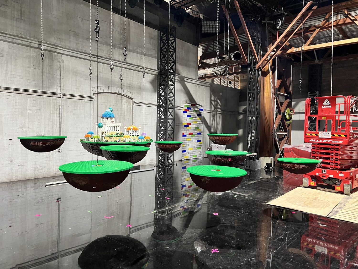Suspended set pieces rigged for a television production