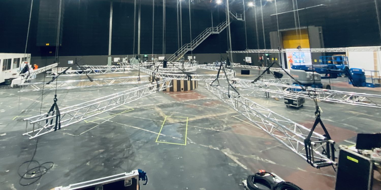 Circular truss grid rigged in a broadcast studio